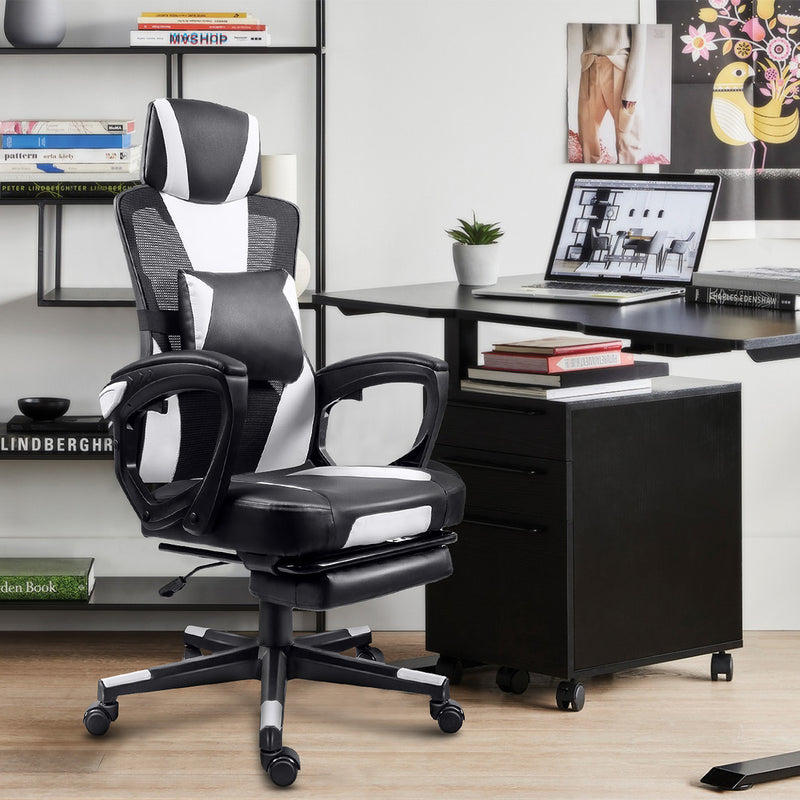 GGCIR Gaming Chair with Footrest in a modern home office. Stylish black and white design with ergonomic lumbar support and adjustable reclining backrest.