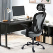Ergonomic office chair with adjustable arms and headrest in a modern workspace