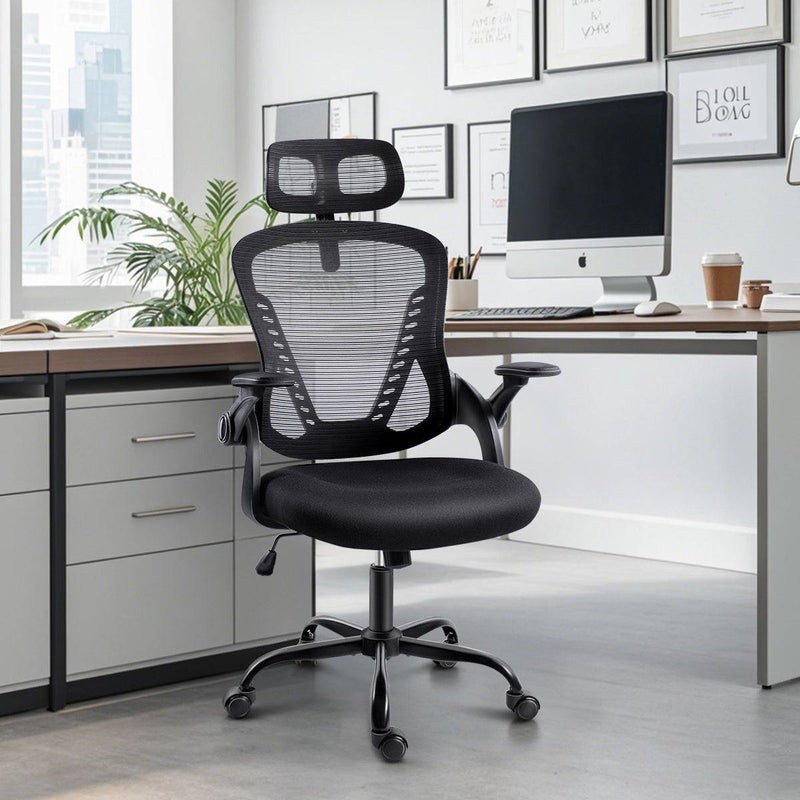 GGCIR Black Ergonomic Office Chair placed in a modern office setting, complementing a professional workspace with its sleek and functional design.