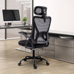 Rear view of the GGCIR Mesh Ergonomic Office Chair in a contemporary office, showcasing its breathable mesh back and adjustable features.